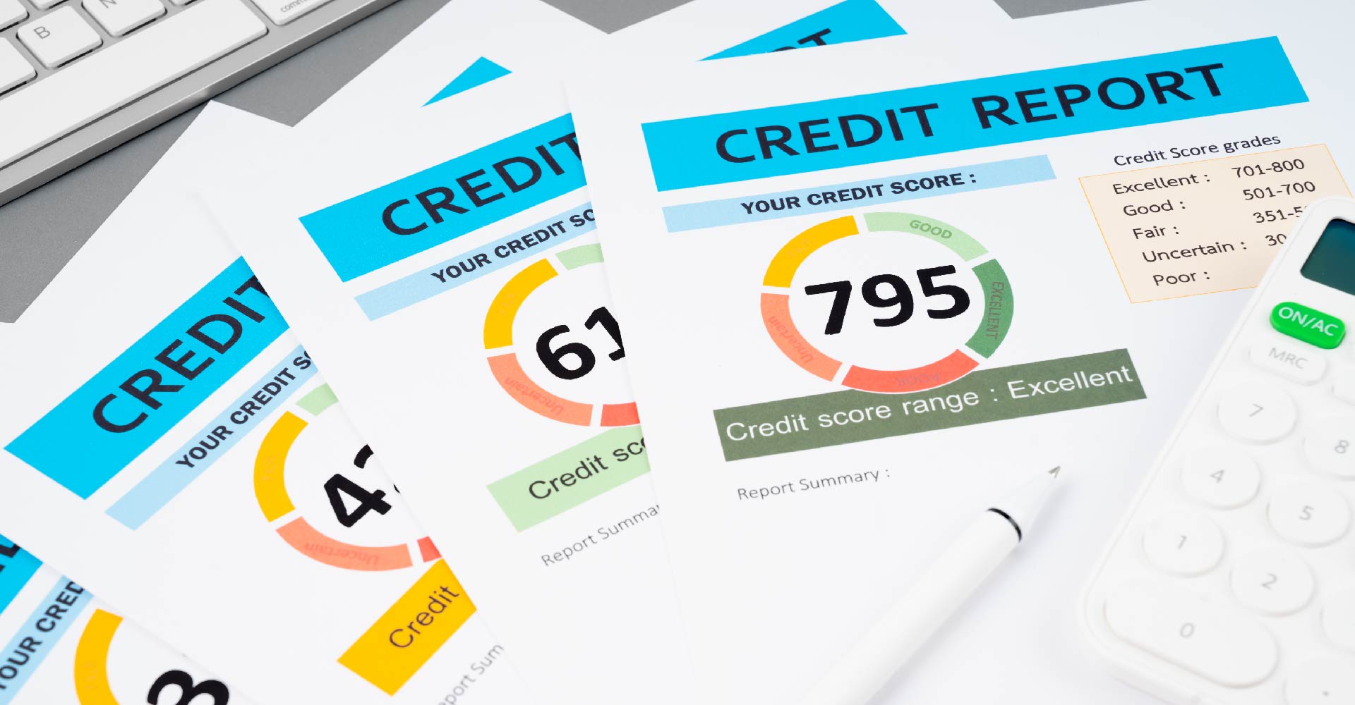 Several sheets of paper with the headline of Credit Score, showing increasingly higher numbers